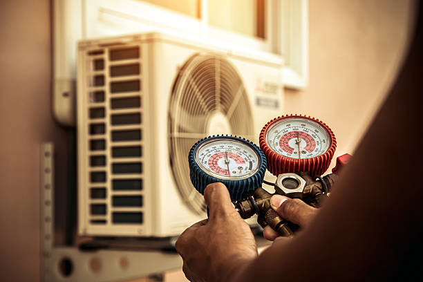 Professional Hvac technician working in Chatham, IL